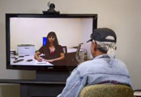 Veteran with caregiver on video conference